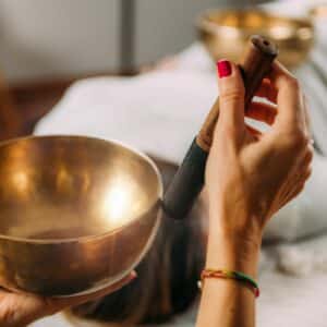 woman-playing-tibetan-singing-bowl-in-sound-healing-royalty-free-image-1673608575 woman-playing-tibetan-singing-bowl-in-sound-healing-royalty-free-image-1673608575